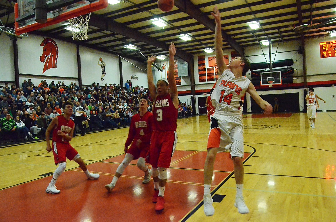 Kyle Weeks (14) makes one last set up and pays off as the Horsemen gain another point on the board (Erin Jusseaume/ Clark Fork Valley Press)