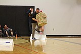 Teachers tackle obstacle course in Toys for Teens challenge
