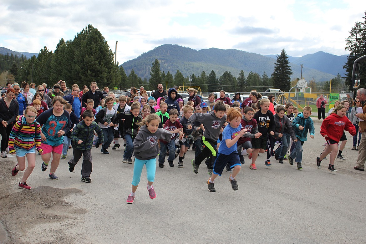 Students Gather for Annual Mineral County Fun Run, May 10: Around 350 kids from all three Mineral County schools participated in the annual Mineral County Fun Run held in St. Regis on May 2. Here Kindergarten through fourth graders start their 1-mile race. (Kathleen Woodford/Mineral Independent).