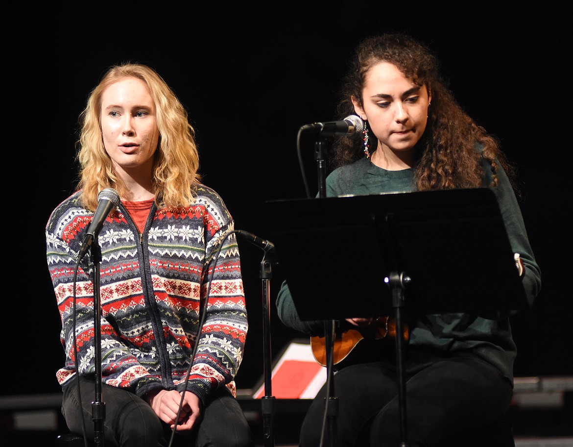 Whitefish High School students Julia Esakoff and Myah Strause sing during last week's choir concert at the Whitefish Performing Arts Center.