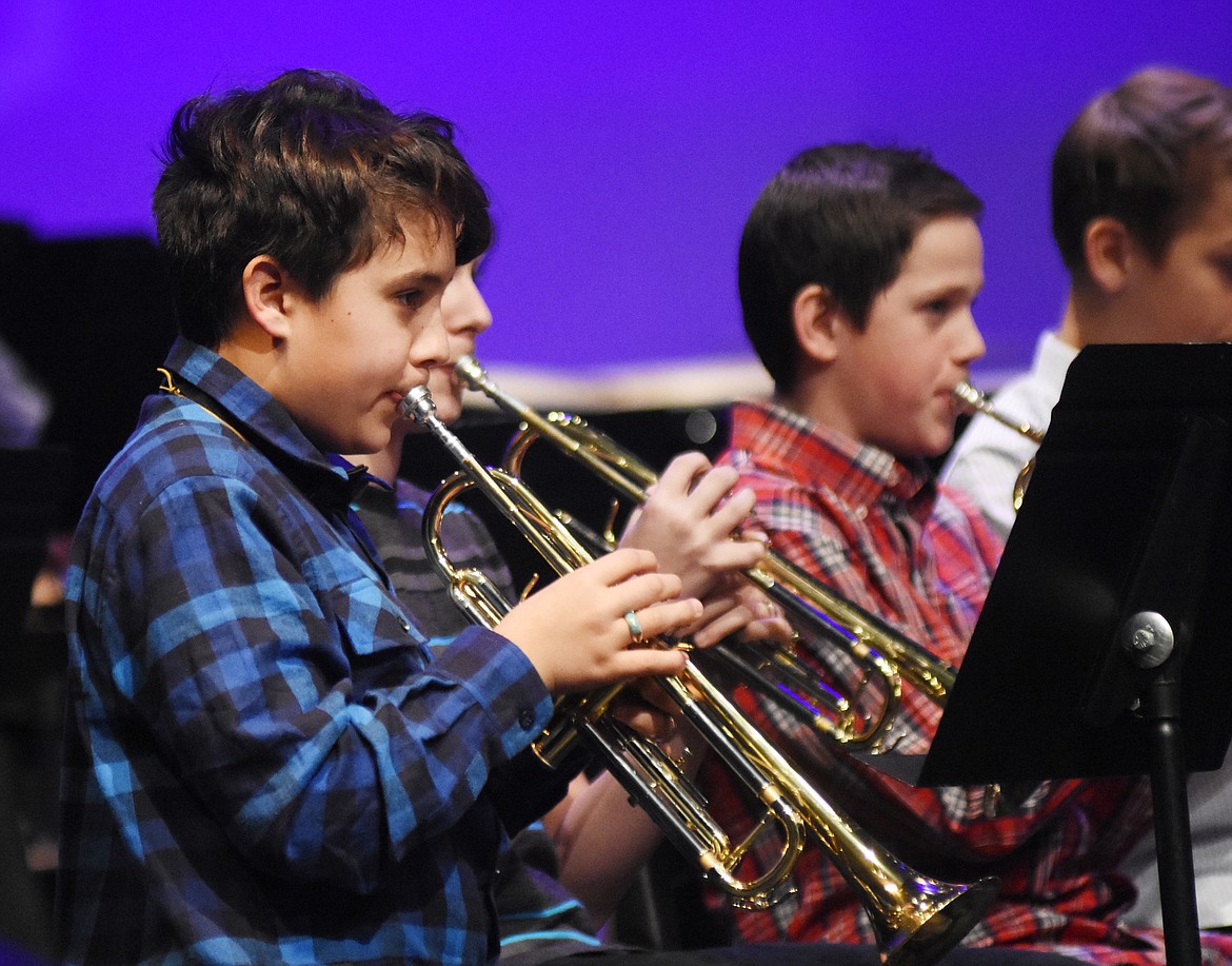 Whitefish Middle School eighth graders Gabriel Kruzich plays the trumpet during a band concert recently at the Whitefish Performing Arts Center. (Heidi Desch/Whitefish Pilot)