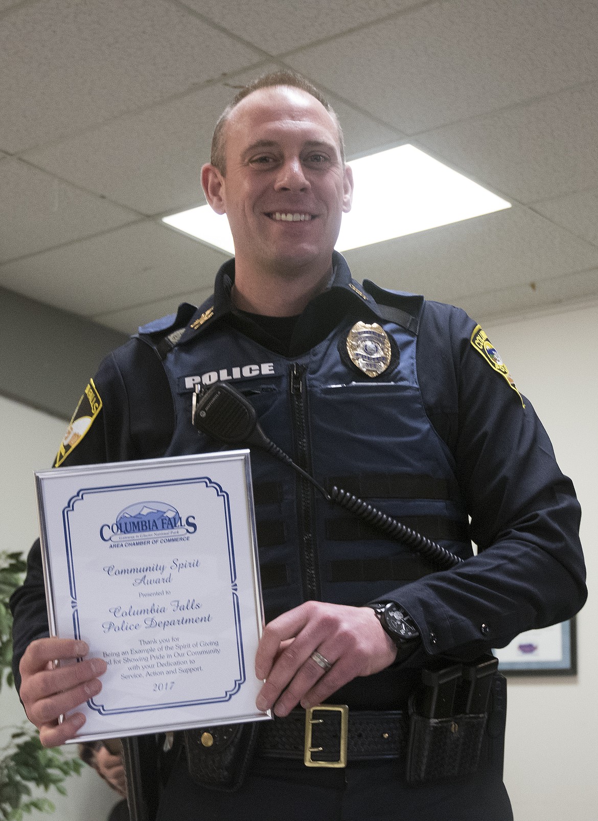 Chief Clint Peters and the Columbia Falls Police Department were honored at the Columbia Falls Area Chamber of Commerce Christmas Luncheon last week. (Jeremy Weber photo)