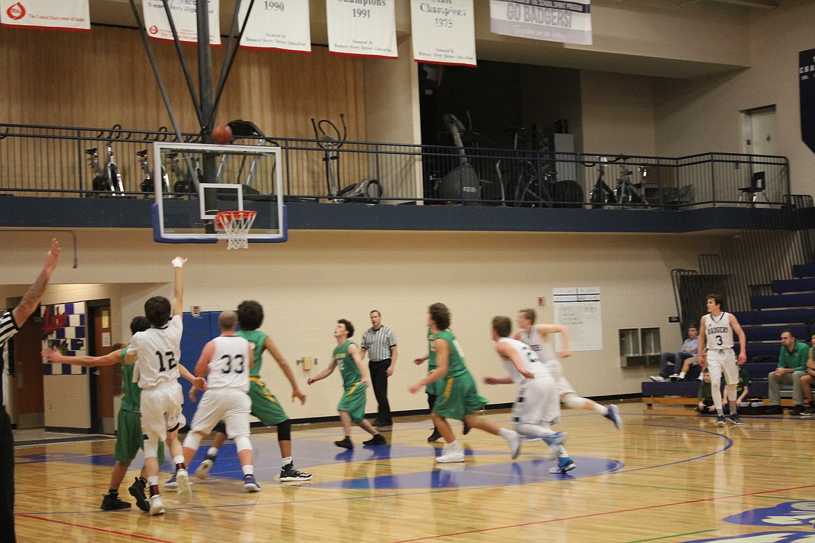 Dylan Hittle shoots a 3-pointer against Lakeland. Hittle scored 14 points in the game.