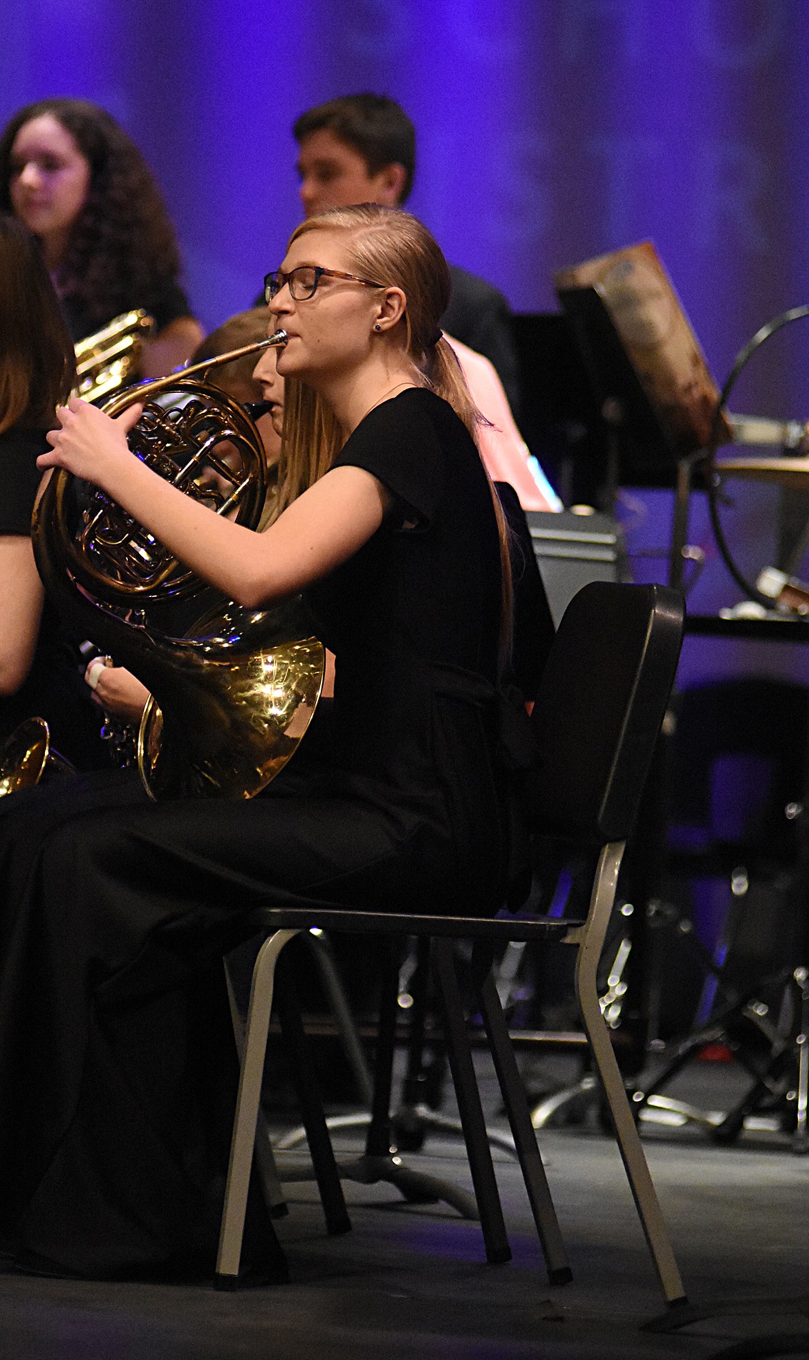 Whitefish High School student Stacia Tremper  plays the French horn during a band concert recently at the Whitefish Performing Arts Center. (Heidi Desch/Whitefish Pilot)