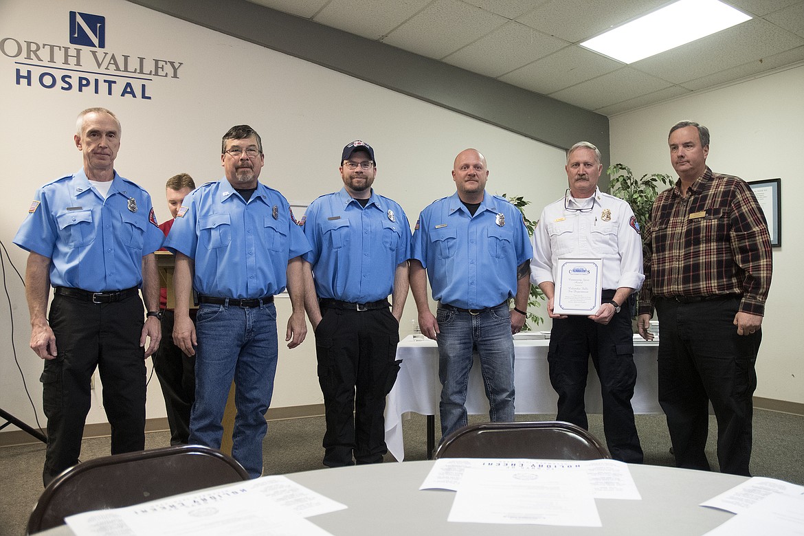 The Columbia Falls Fire Department was honored at last week&#146;s Chamber of Commerce Christmas Luncheon. Pirctured, left to right, are Mike Vanhaverbeke, Joe Smith, Ty Shanks, Jamey Green, Chief Rick Hagen and Chamber of Commerce Vice President Phil Carl. (Jeremy Weber photo)