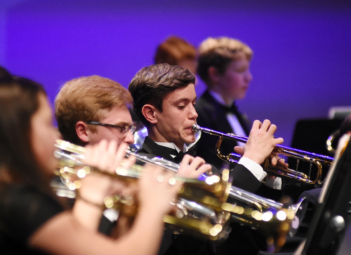 Whitefish High School students Josiah Holien and Eric Holdhusen both play the trumpet during a band concert recently at the Whitefish Performing Arts Center. (Heidi Desch/Whitefish Pilot)