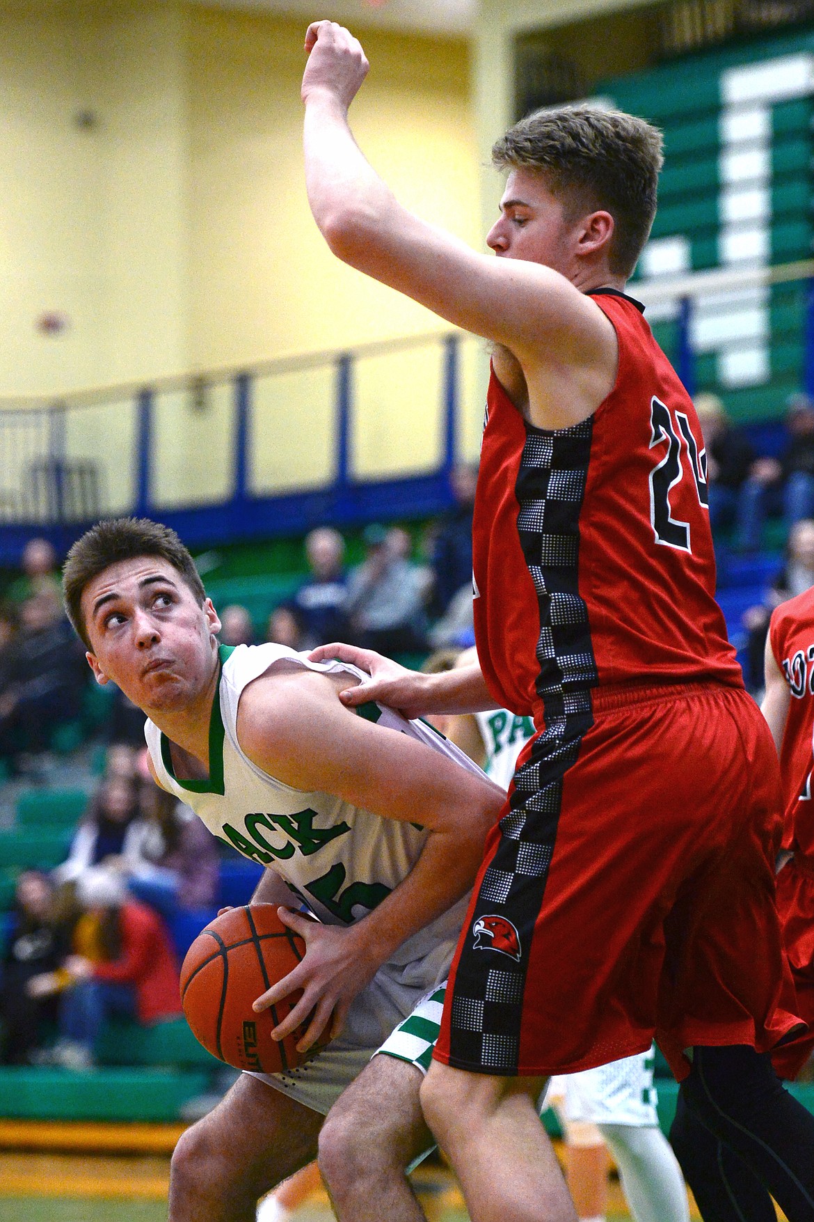 Glacier's Nick Whitman looks for room to shoot with Bozeman's Jack Carr defending. (Casey Kreider/Daily Inter Lake)