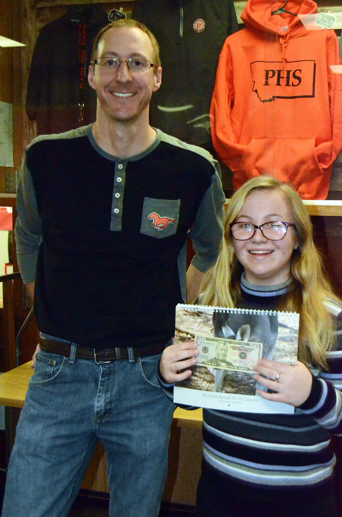 Maddie Madden with her award from the Valley Press Reporters Contest.