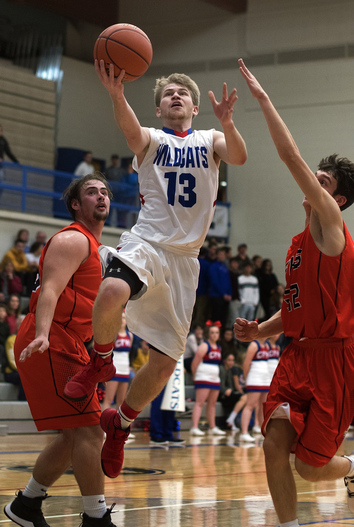 L.J. Panasuk goes in for a layup against Flathead. (Jeremy Weber photo)