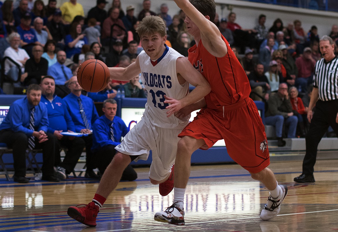 L.J. Panasuk drives inside against Flathead. (Jeremy Weber photo)