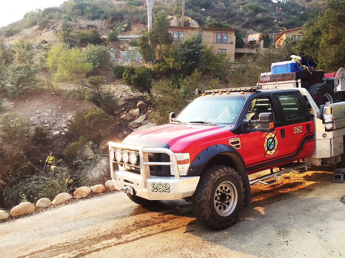 A Whitefish fire truck has a black stripe across the logo in honor of Cory Iverson, 32, the&#160;California Department of Forestry and Fire Protection&#151; also known as Cal Fire &#151; engineer from San Diego, who died fighting the Thomas Fire in Ventura County. &#147;We are on the same fire as Cory Iverson was,&#148; said Cole Hadley of the Whitefish Fire Department. &#147;There were 8,000 firefighters working this fire at its peak so it&#146;s hard to say if we were ever in the same briefings, but the fire service is a unique brotherhood and you don&#146;t have to know someone personally to feel the loss. We feel for his family and his fire family. We all know too well how painful the loss of a brother firefighter and friend can be. Our thoughts have been with them throughout the past week.&#148;&#147;The only thing we can do is continue to fight this fire with all we have.&#148;According to Hadley the strike team from Flathead County, which includes firefighters from Whitefish, Evergreen, Bigfork and Marion, is expected to complete their time in California on Friday. If they are needed longer, the entire team is willing to stay. If they are dismissed Friday, they will have a 2 and half day journey back to the Flathead and should arrive sometime on Christmas Eve day.(Photo courtesy of Cole Hadley, Whitefish Fire Department)