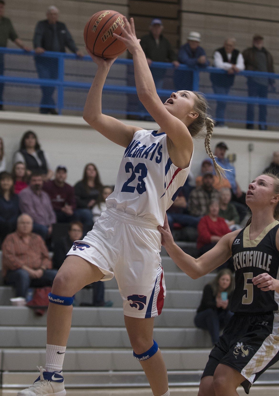 Ryley Kehr finishes off the fast break againt Stevensville. (Jeremy Weber photo)