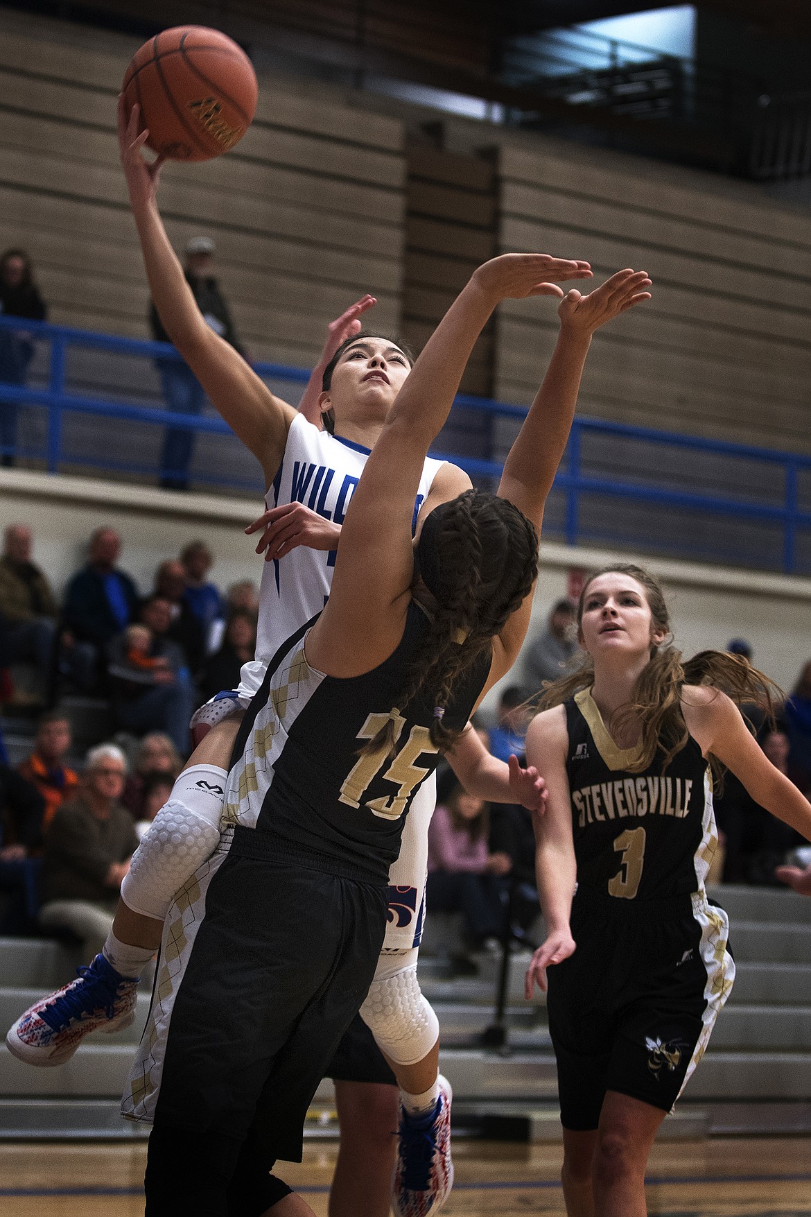 Dani Douglas goes up for a tough shot against Stevensville Thursday. Douglas had seven points and seven assists in the contest. (Jeremy Weber photo)