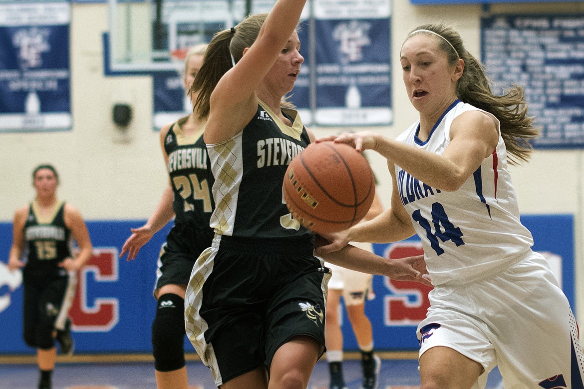 Josie Windauer drives to the hoop against Stevensville. (Jeremy Weber photo)