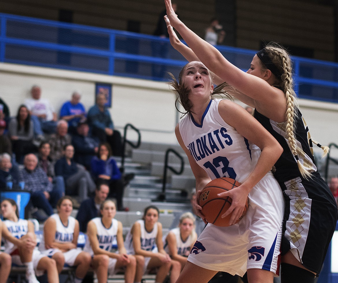 Hannah Gedlaman takes the ball inside against Stevensville. (Jeremy Weber photo)