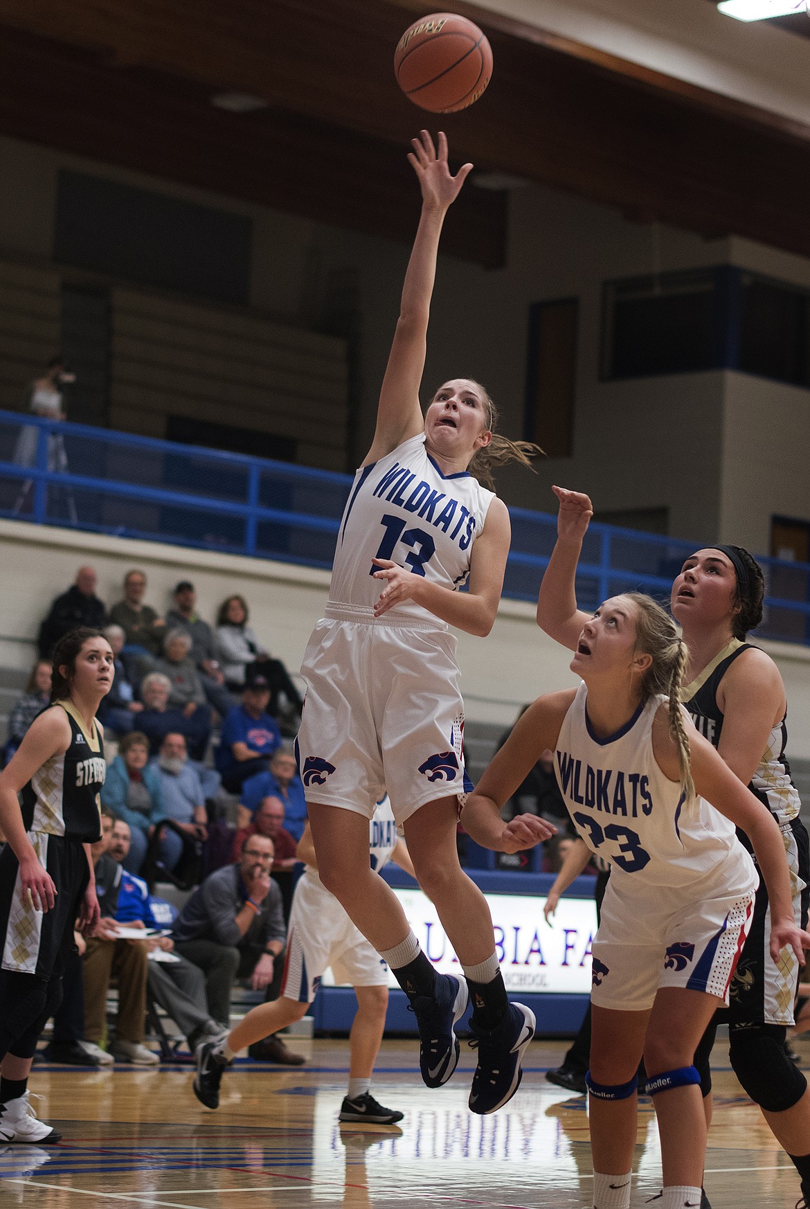 Hannah Gedlaman pulls up for a running shot against Stevensville. (Jeremy Weber photo)