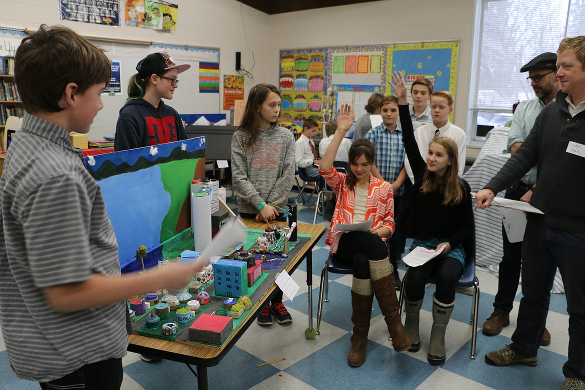 (Photo by MARY MALONE)
Washington Elementary sixth-graders, from left, Ryder Haynes, Livia Owens, Emele Dillon, Audrey Hewitt and Alayna Lies discussed the details of their Future City with judges on Friday.