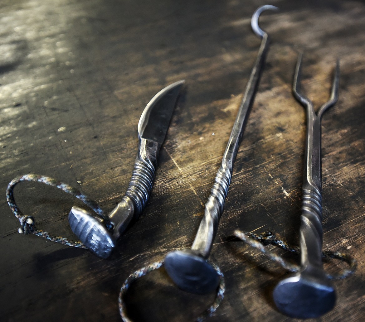 A collection of utensils created by Andreas Hornsteiner at Rebel Mountain Forge by using old iron railroad spikes. Hornsteiner has been selling his wares at local farmers markets.