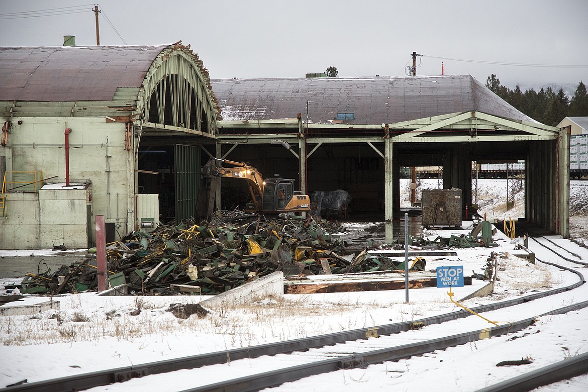 Demolition work continues at the former Weyerhaeuser plywood warehouse facility in Columbia Falls. (Jeremy Weber photo)