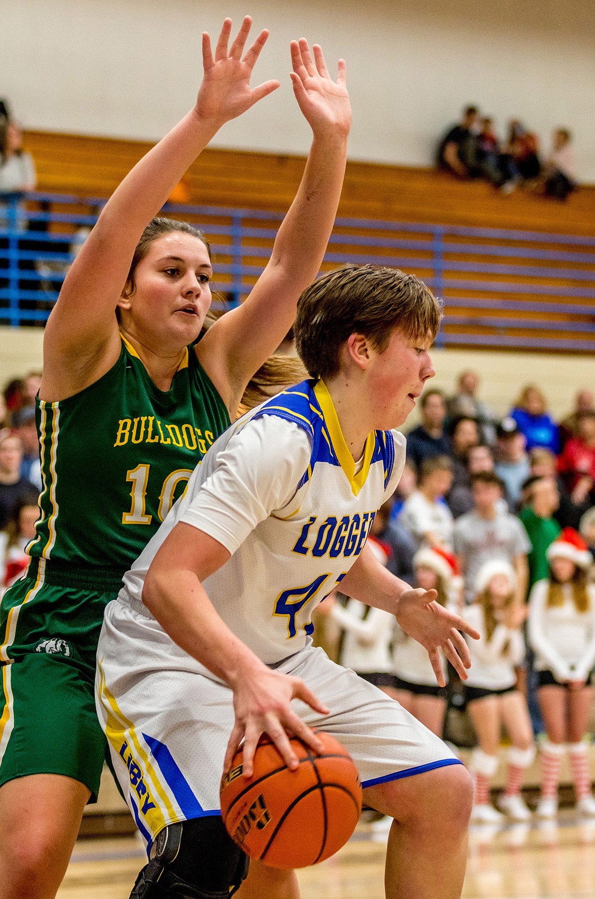 Whitefish&#146;s Hope Brown guards against Libby&#146;s Shannon Reny Thursday night in Libby. (John Blodgett/The Western News)