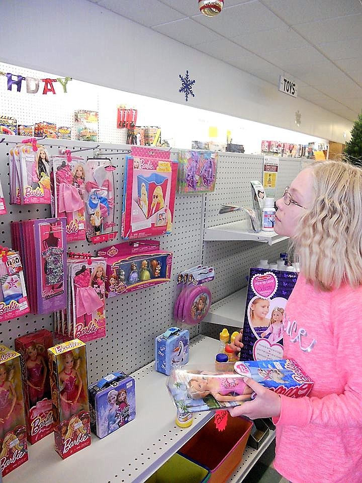 Students in Mrs. Crabb&#146;s fourth-grade class shopped for Christmas gifts at local stores as part of a holiday gift project.