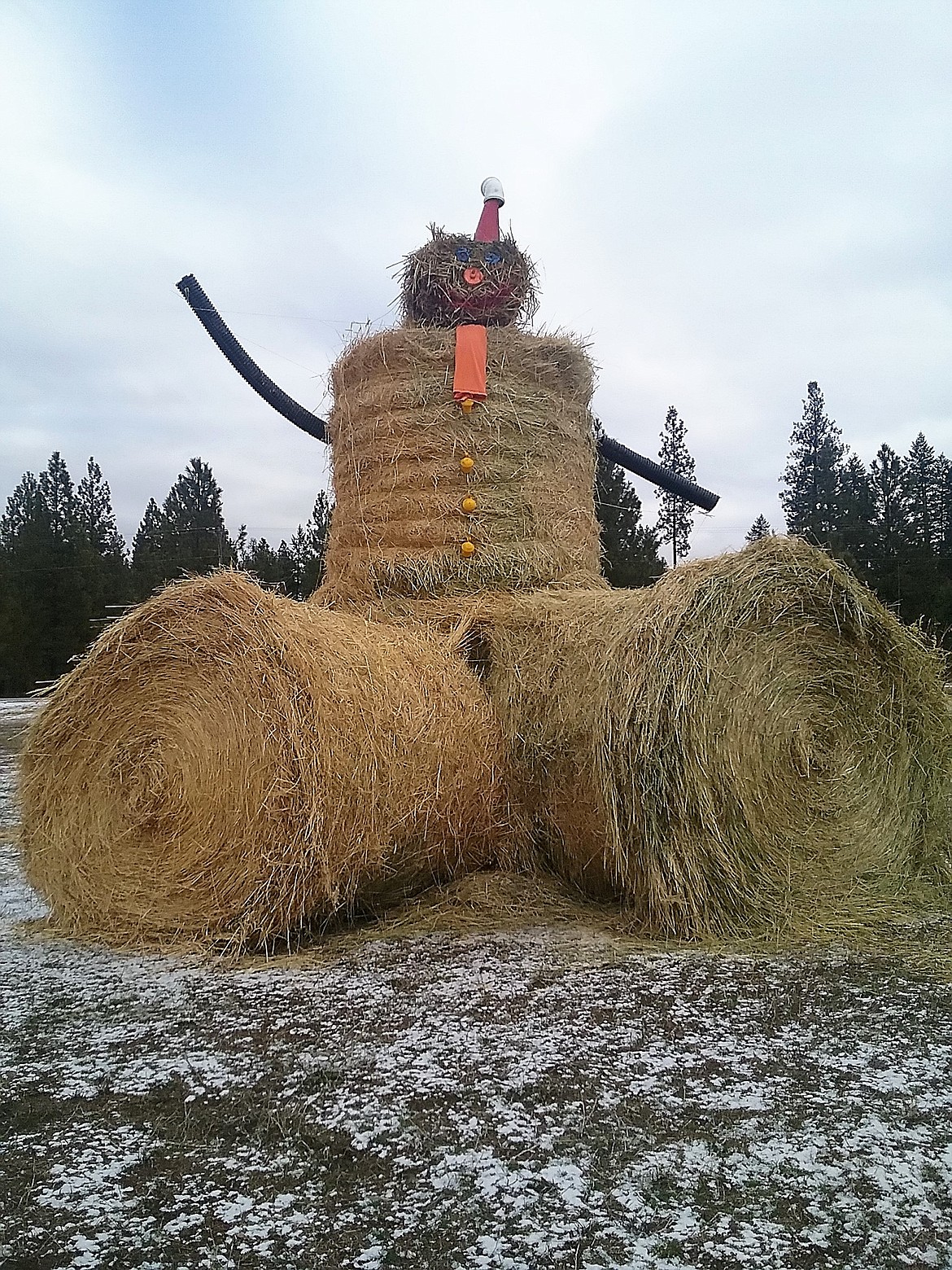 House District Rep. Denley Loge had a hay of a time creating a giant Santa for travelers driving along I-90 east of St. Regis. Loge raises cattle in the area and couldn&#146;t resist &#147;bucking&#148; regular Christmas decorations for something a little less traditional. (Photo courtesy of Denley Loge)