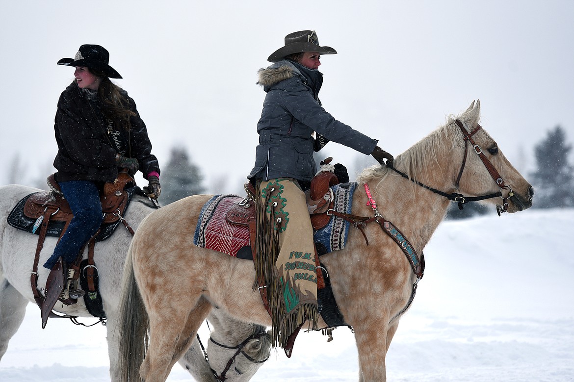 Riders walk their horses through the skijoring course at Rebecca Farm on Saturday, Dec. 30. (Casey Kreider/Daily Inter Lake)