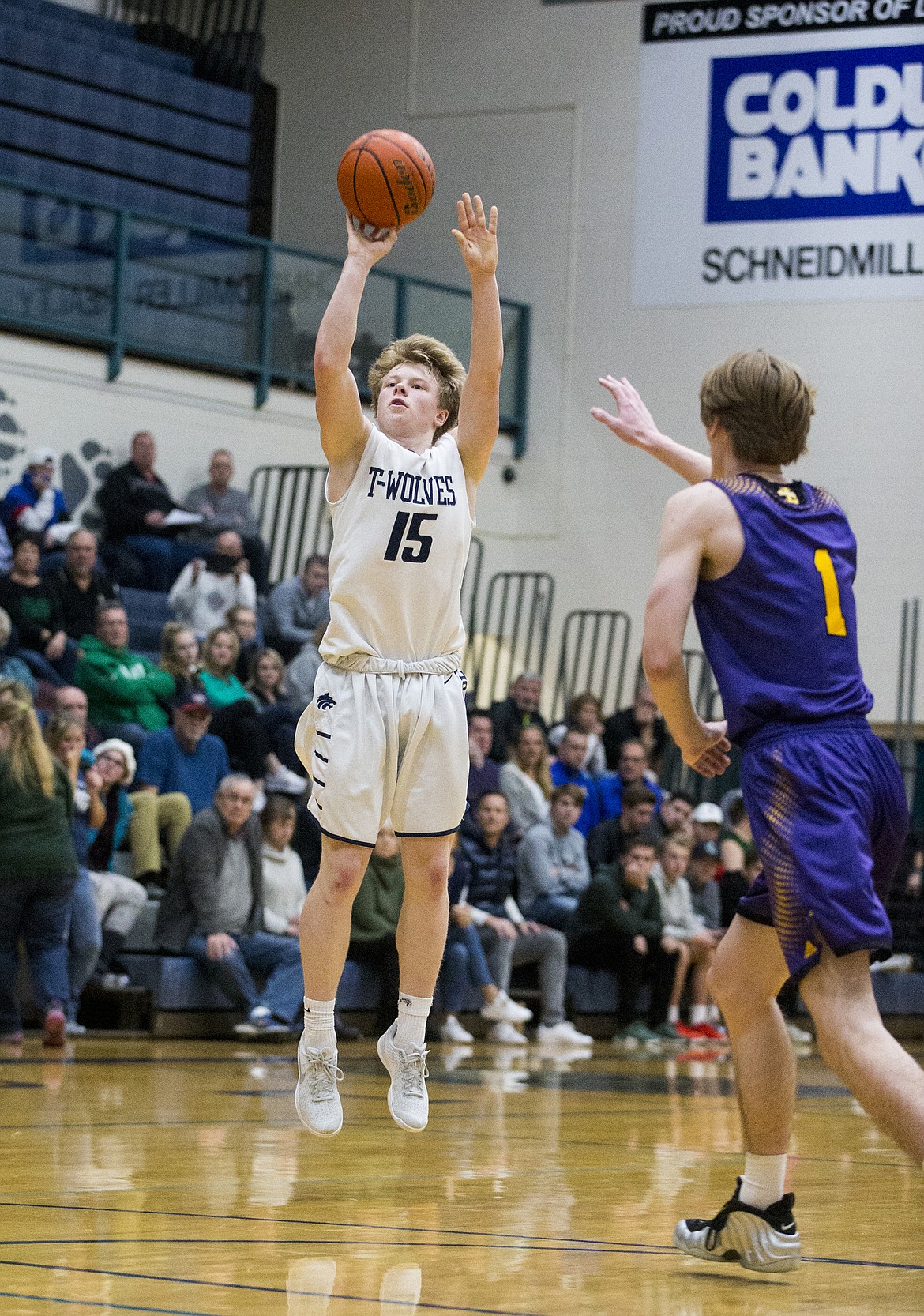 Lake City&#146;s Hunter Schaffer shoots a 3-pointer during a game against Lewiston.