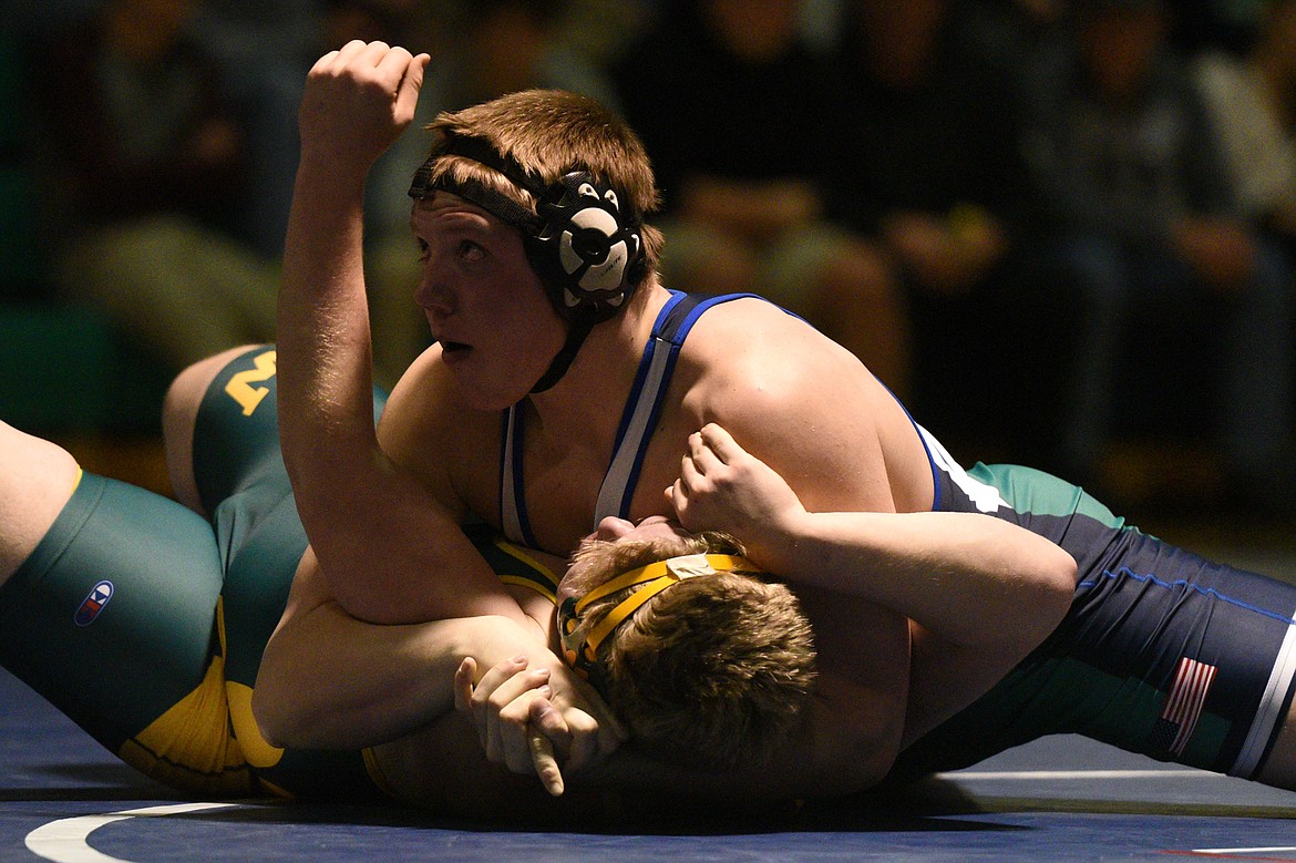 Glacier&#146;s Tre Krause, top, works toward a pin of Whitefish&#146;s Keegan Wold at 285 pounds. (Casey Kreider/Daily Inter Lake)