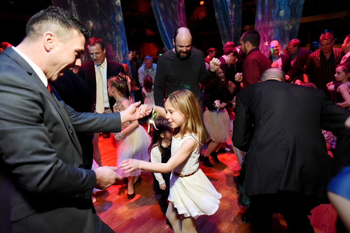 Alan Brooks dances with his daughter Jezanie, 7, at the Father/Daughter Winter Ball at the Whitefish Theatre Company on Feb. 3. For the Brooks family, the dance was part of the celebration of Jezanie&#146;s birthday.