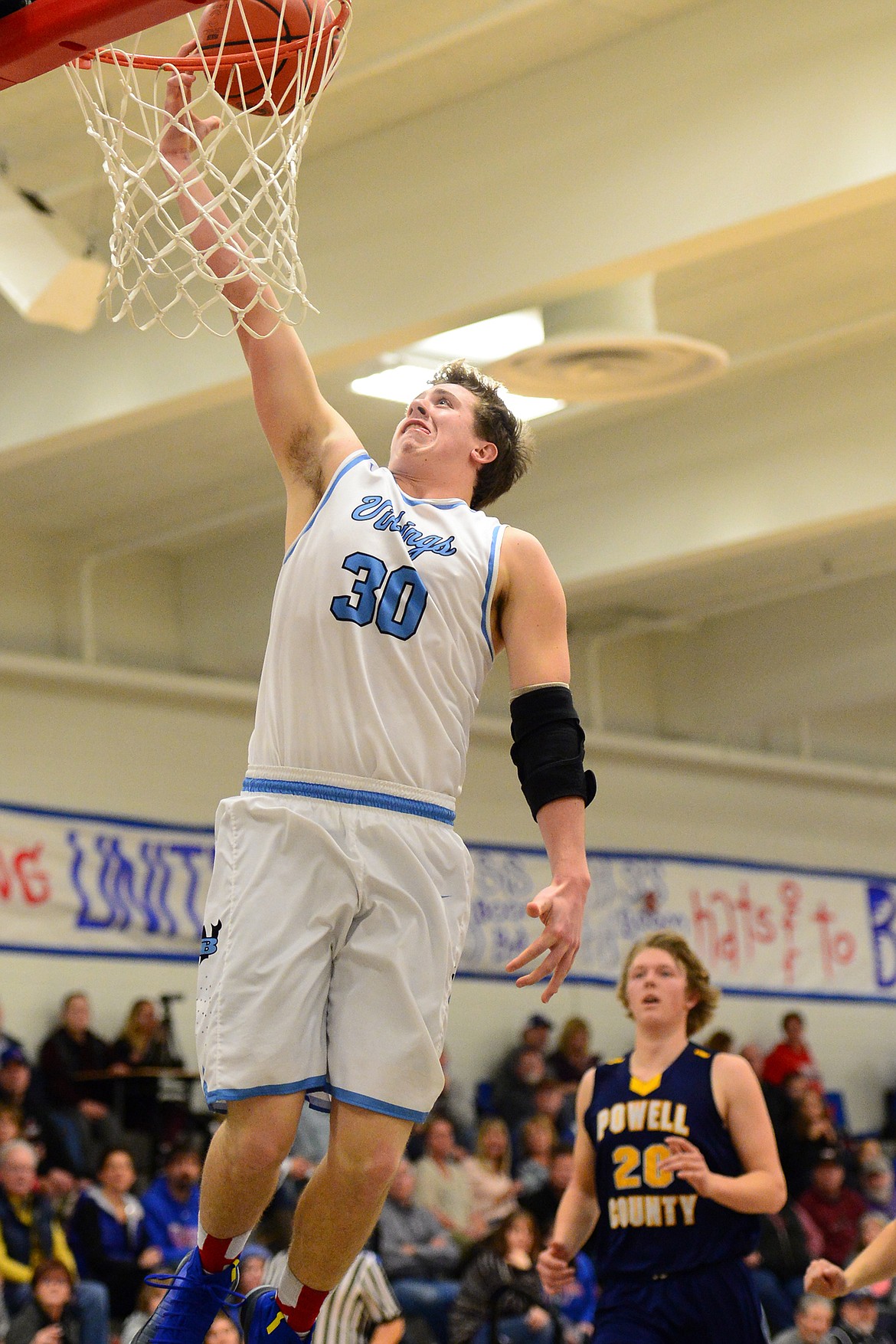 Bigfork's Logan Gilliard lays in two points against Deer Lodge. (Casey Kreider/Daily Inter Lake)