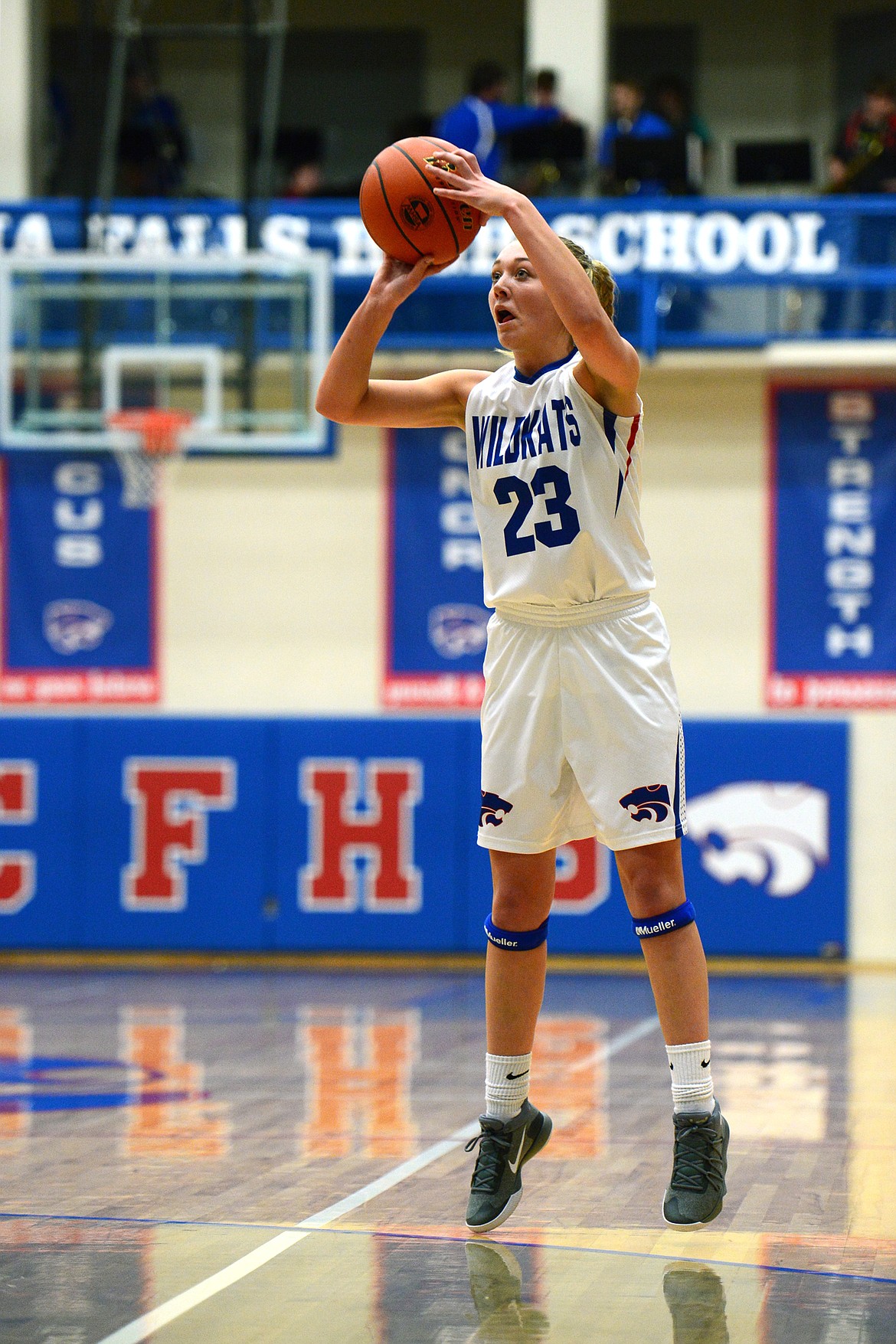 Columbia Falls' Ryley Kehr sinks an open three-pointer in the second quarter against Libby. (Casey Kreider/Daily Inter Lake)