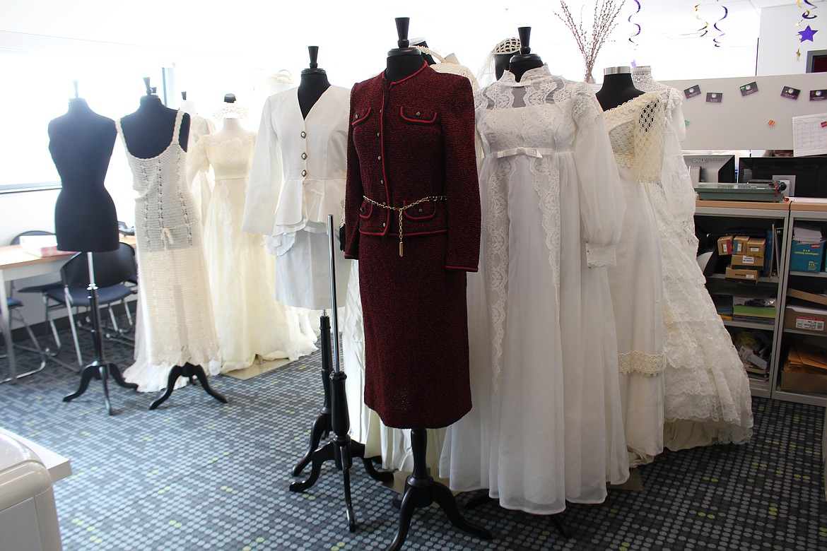 Cheryl Schweizer/Columbia Basin Herald
Wedding dresses and wedding suits filled the office at the Moses Lake Museum &amp; Art Center last week. The dresses are part of the new &#145;I Do&#146; exhibit opening Friday.