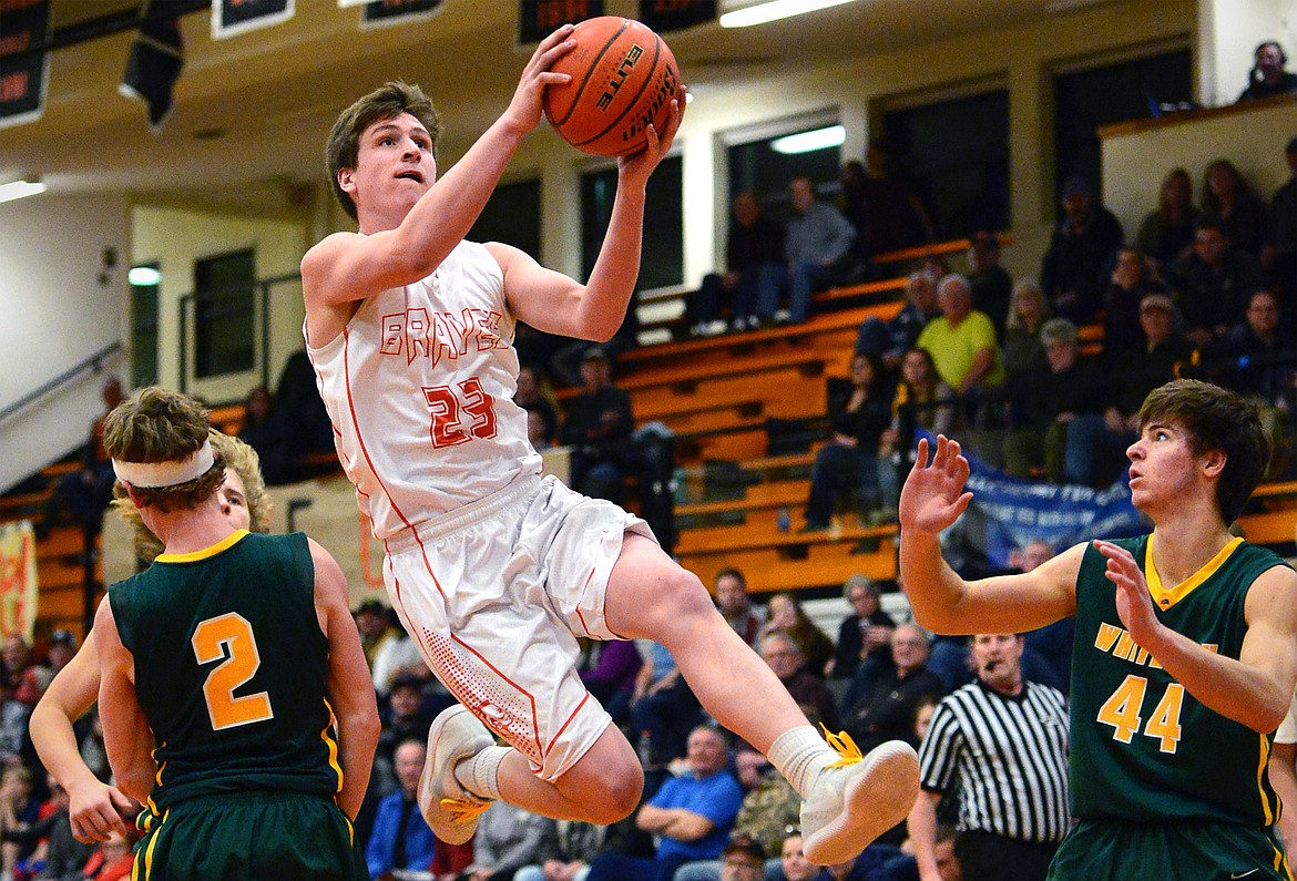 Flathead&#146;s Eric Seaman drives to the hoop for a layup against Whitefish. (Casey Kreider/Daily Inter Lake)