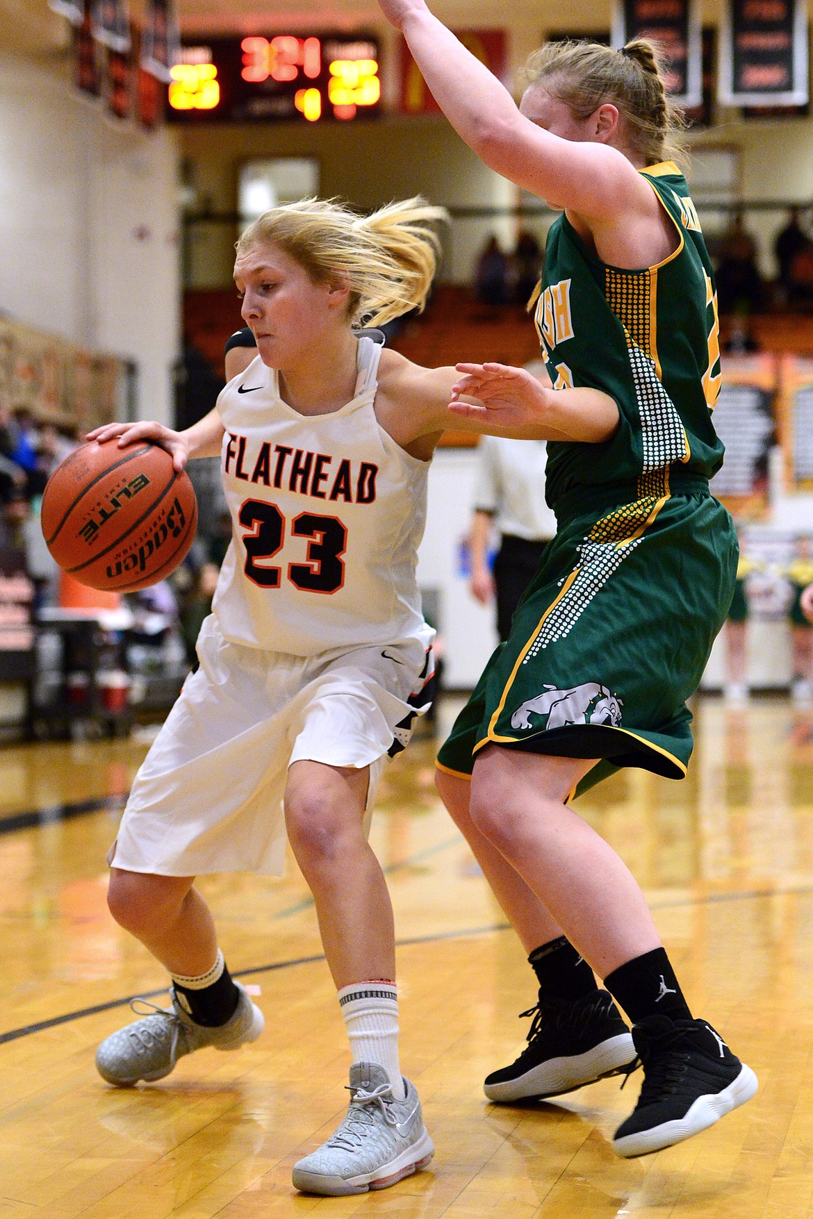 Flathead&#146;s Clara Vandenbosch looks for room with Whitefish&#146;s Annisa Brown defending. (Casey Kreider/Daily Inter Lake)