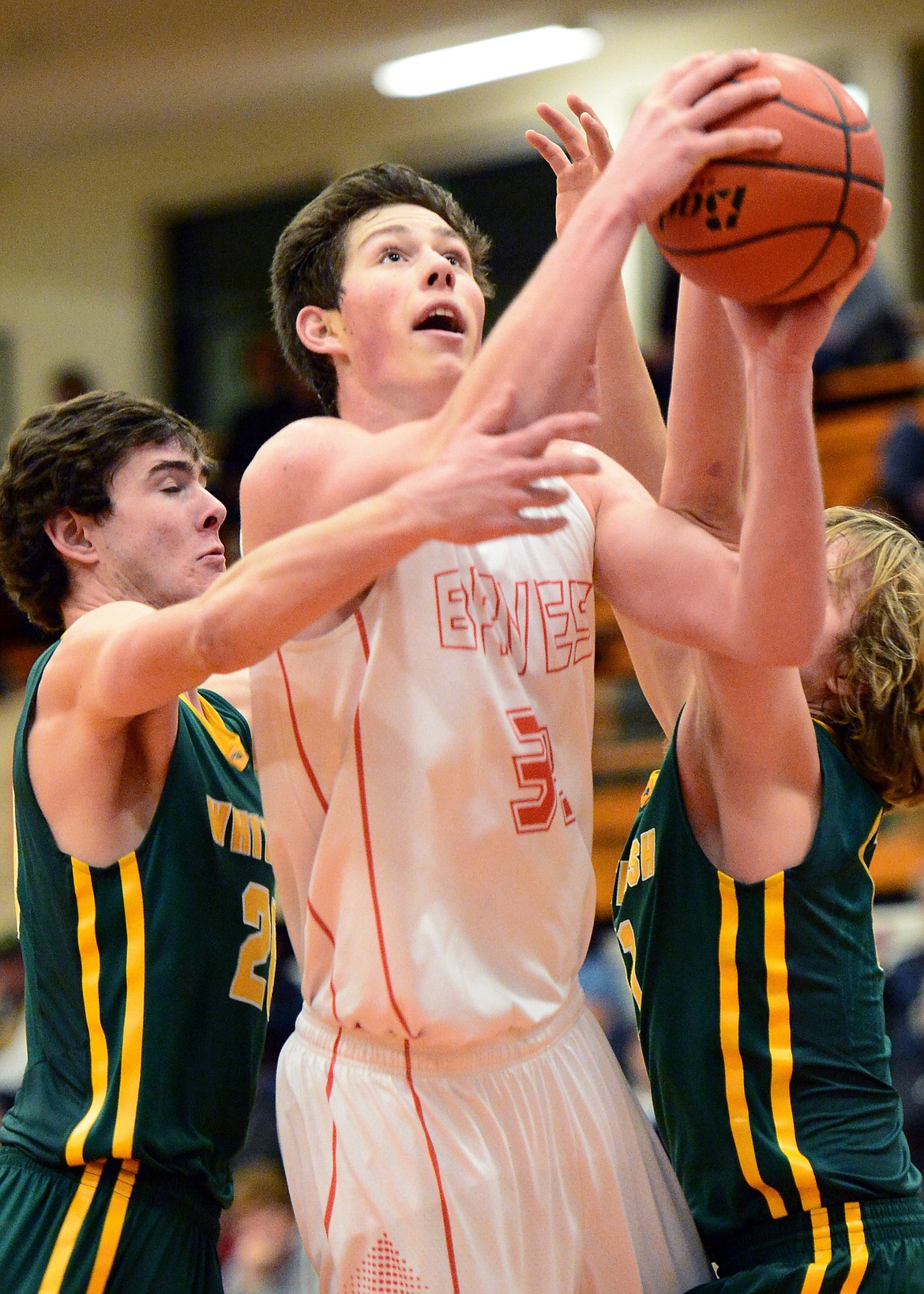 Flathead&#146;s Sam Elliott powers to the hoop against Whitefish. (Casey Kreider/Daily Inter Lake)