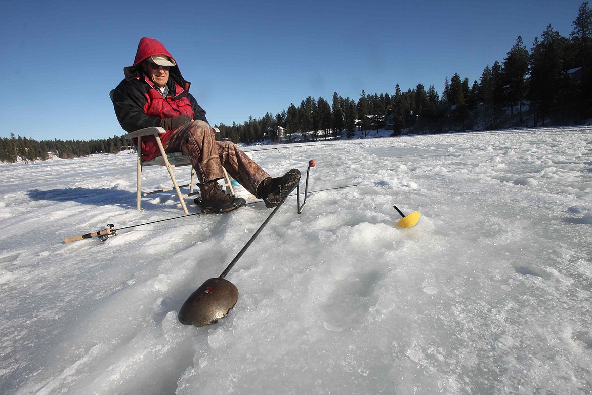 RALPH BARTHOLDT/Press
Longtime ice angler Ron James, of Hayden, dropped two lines into Avondale Lake Wednesday in search of rainbow trout. The ice is about 6 inches thick on Avondale Lake, which saw a lot of ice fishing traffic last weekend, James said.