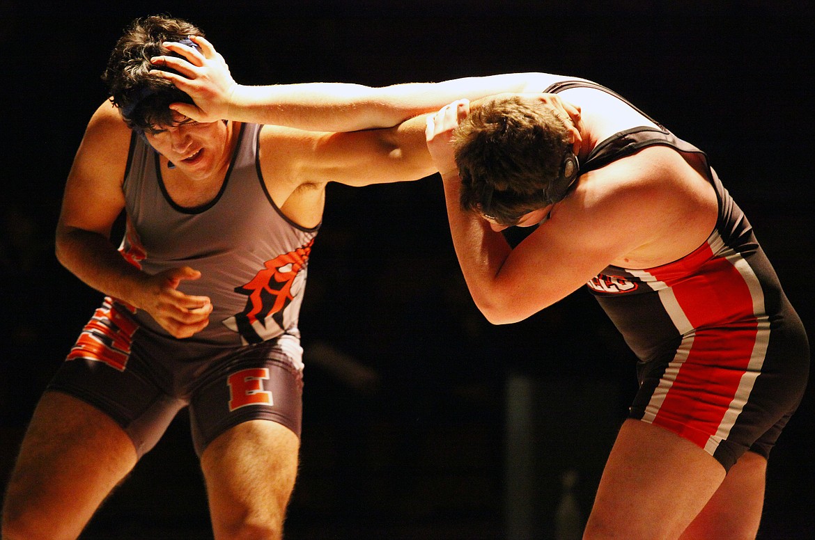 Rodney Harwood/Columbia Basin HeraldEphrata heavyweight Efrain Bedolla, left, jockeys for an advantage against Elijah Roylance during the 285-pound match Thursday night at PJ Taggares Gym.