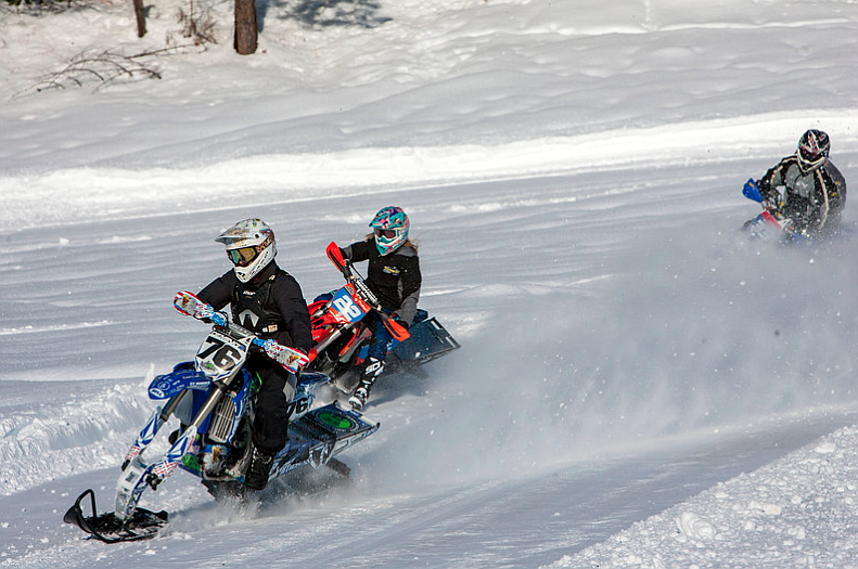 Photo by HEATHER COWAN
BRRAAAP! Snowbike competitors tear up the course up in Mullan last weekend during Winterfest.