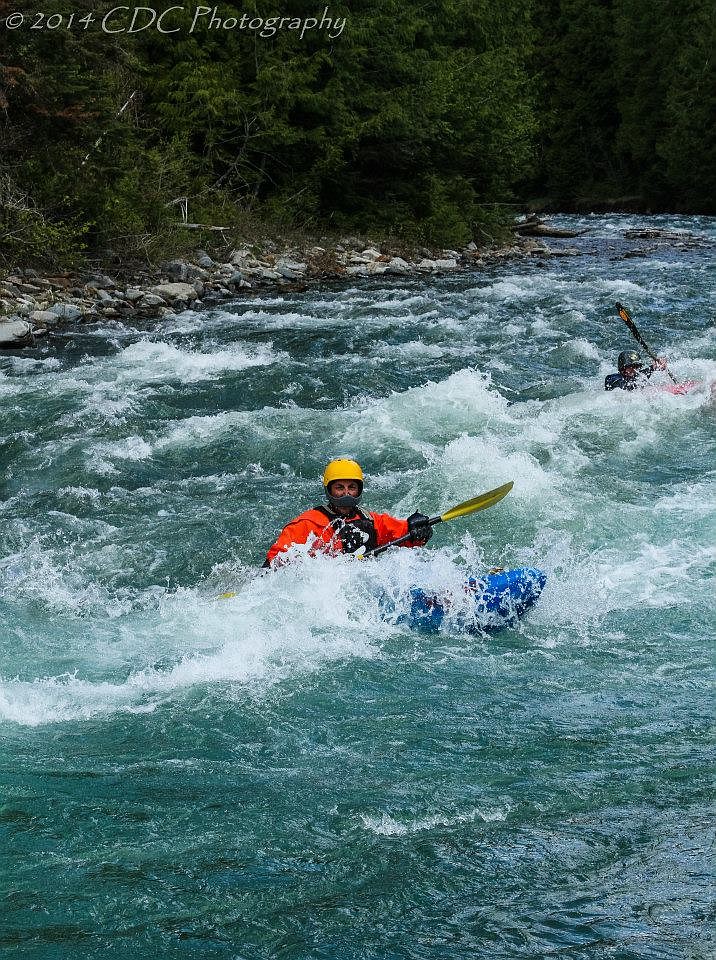 Jason Wilmoth paddles a kayak through whitewater at Lightning Creek. (Photo by CHRIS CELENTANO)