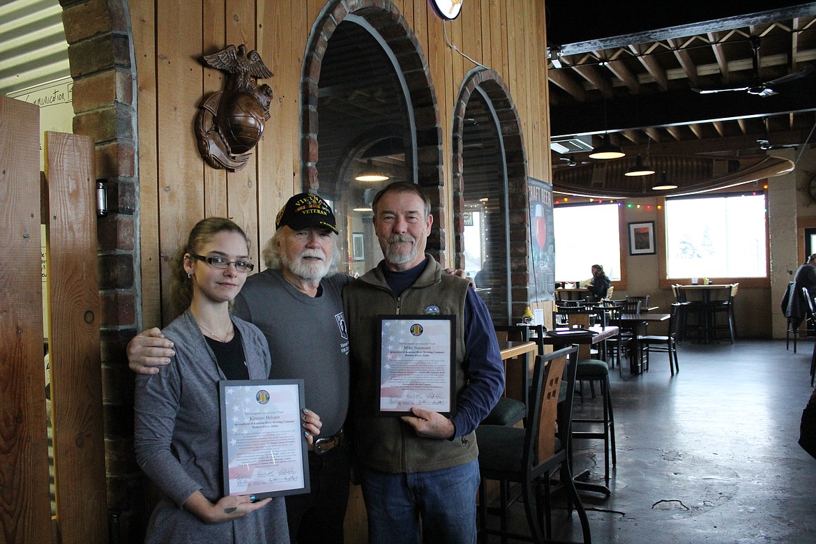 Photo by Tanna Yeoumans
Kimberly Helsper and Mike Naumann pose with Ron Mcllmay after being presented their certificates of thanks.