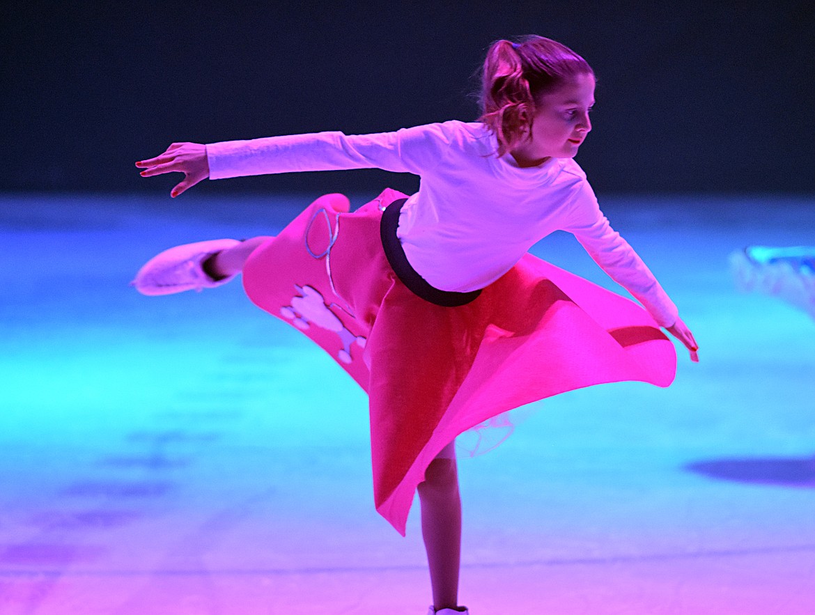 Brooke Osburn skates to Johnny B. Goode Saturday during the Glacier Skate Academy's New Year's On Ice show at the Stumptown Ice Den.