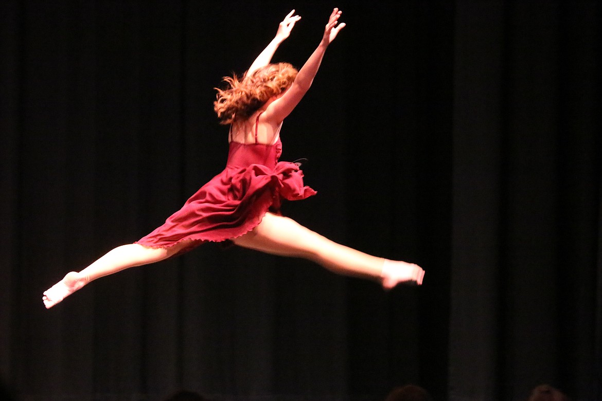 Photo by Mandi Bateman
Alexandra Hough flies through the air during her Lyrical Dance routine for Distinguished Young Women 2017, which Hannah Simms won.