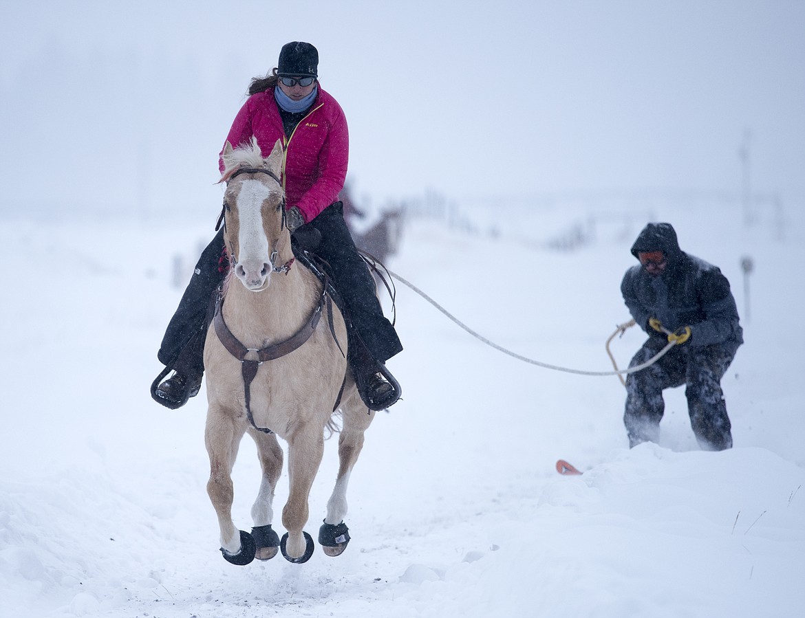 Leah Mitchell and Justin Kreps practice at her pasture in rural Columbia Falls.