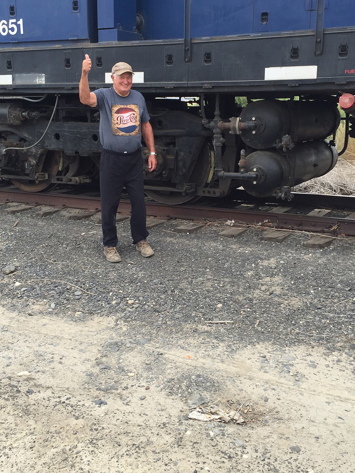 Cathy Potter Courtesy Photo - Frank Mianecki stands by the first locomotive that had been run on the track for over 20 years.