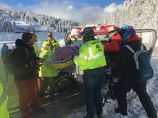 Members from the West End Volunteer Fire Department and the Superior Ambulance Crew responded to the scene of an injured snowmobiler on Dec. 23 at Lookout Pass. (Photo courtesy of Art Drobny)