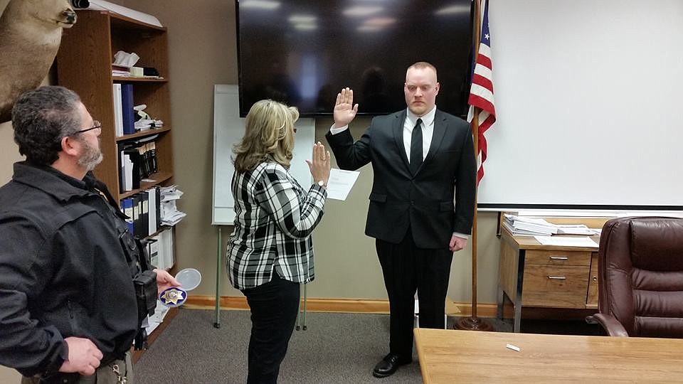 Deputy Bry Townsley was sworn in by County Commissioner Laurie Johnston in December. (Photo courtesy of Mineral County Sheriff&#146;s Department).