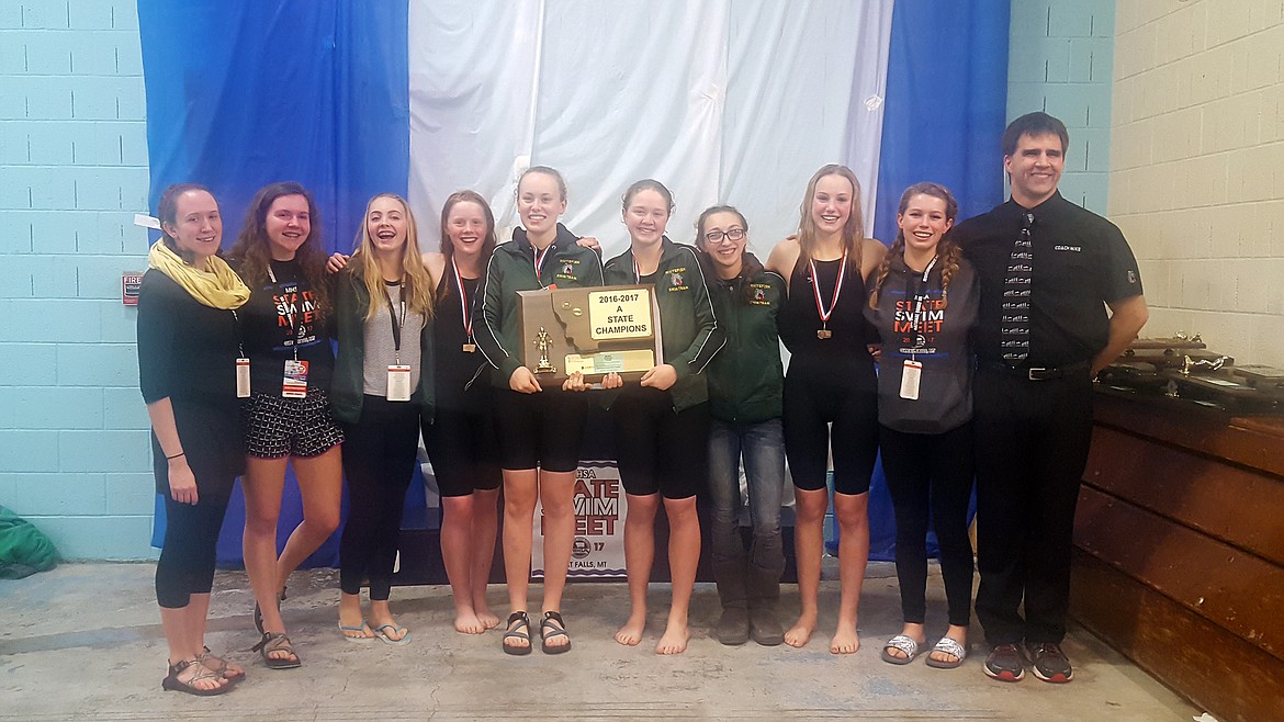 The state champion swim team is: Head Coach Amy Caudill, Kaylee Hickman, Lauren York, Annie Sullivan, Sonja Ring, Jessica Young, Alice Wilde, Annie Sullivan, Katy Dolan and Assistant Coach Mike Nelson. (Photo courtesy Cherry Creek Images)