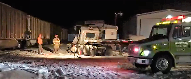 A Montana Rail Link train hit a semi-truck that had been stuck on the tracks in Frenchtown on Dec. 27. No injuries were reported. (Photo courtesy of Mel Holtz)