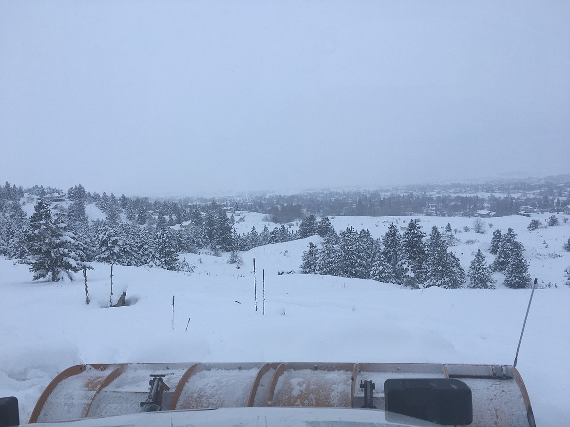 Polson city snow plow trucks have a wand, as shown on the lower right of this photo, to help the truck drivers maneuver the machinery. (Ashley Fox/Lake County Leader)